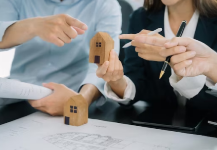 Hands holding model girls at home